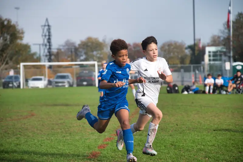 Two players racing for the ball