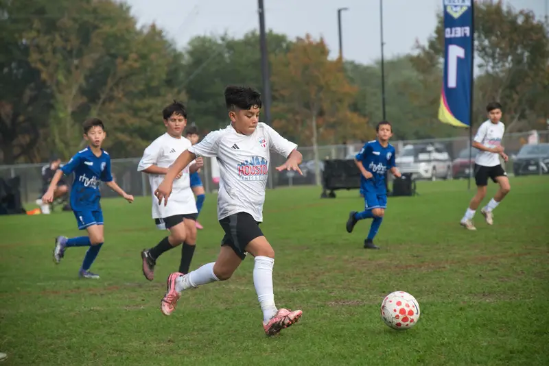Player striking the ball toward goal